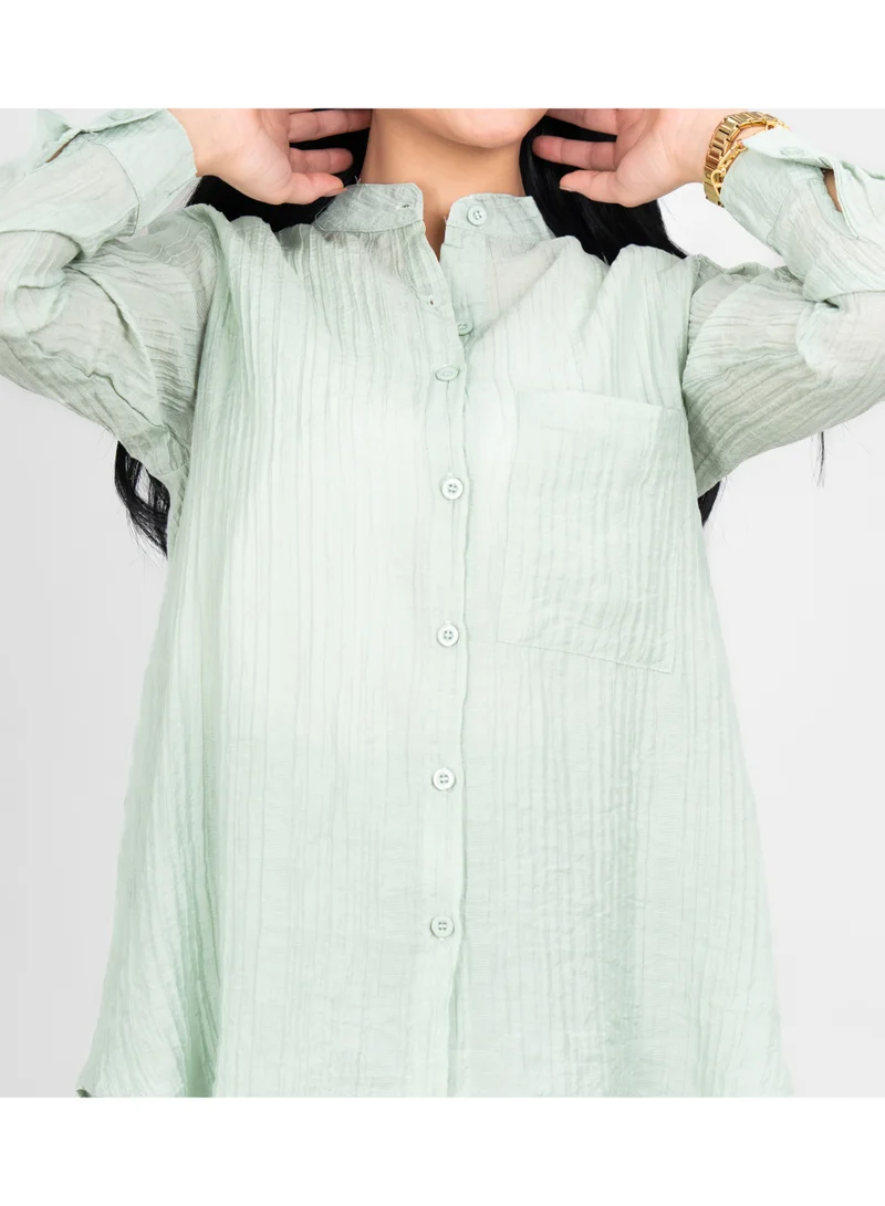 اكسا طقم عصري من قطعتين، قميص وبنطال بلون موحد، قماش شفاف